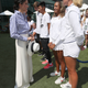 Meghan, Duchess of Sussex meets junior players Whitney Osuigwe of the United States and Caty McNally of the United States during a visit to the Wimbledon Championships on July 14, 2018 in London, England.